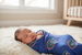 Baby swaddled in University of Florida knit swaddle