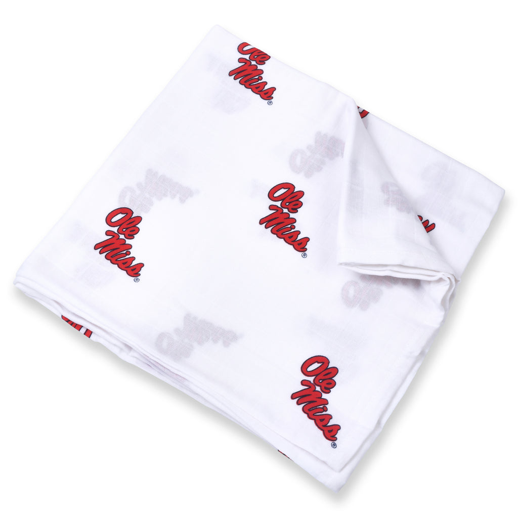 A white muslin swaddle blanket with the University of Mississippi 'Ole Miss' text in red scattered throughout the fabric.