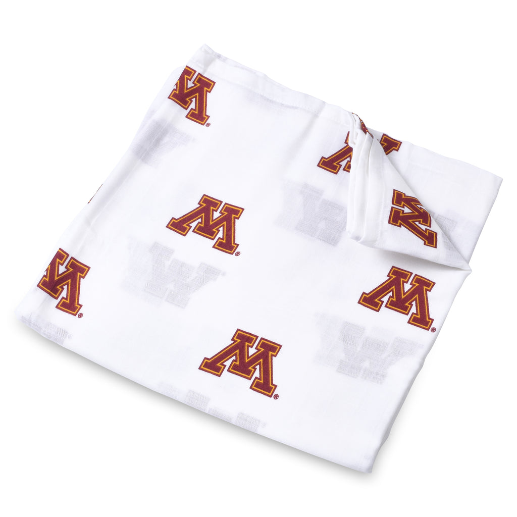 University of Minnesota muslin swaddle blanket with Golden Gophers logo pattern, lightweight 47x47 cotton swaddle displayed to show design and fabric texture
