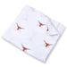 University of Texas muslin swaddle blanket featuring the Longhorns logo, displayed folded to highlight its soft, breathable muslin fabric and modern collegiate design.
